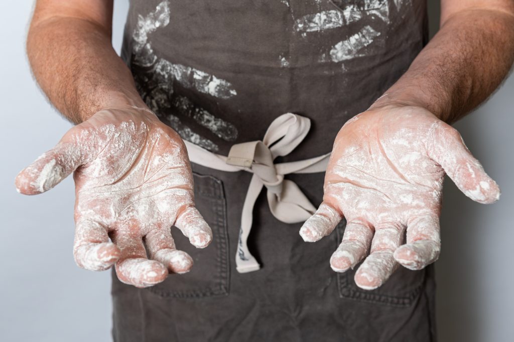 Floured hands